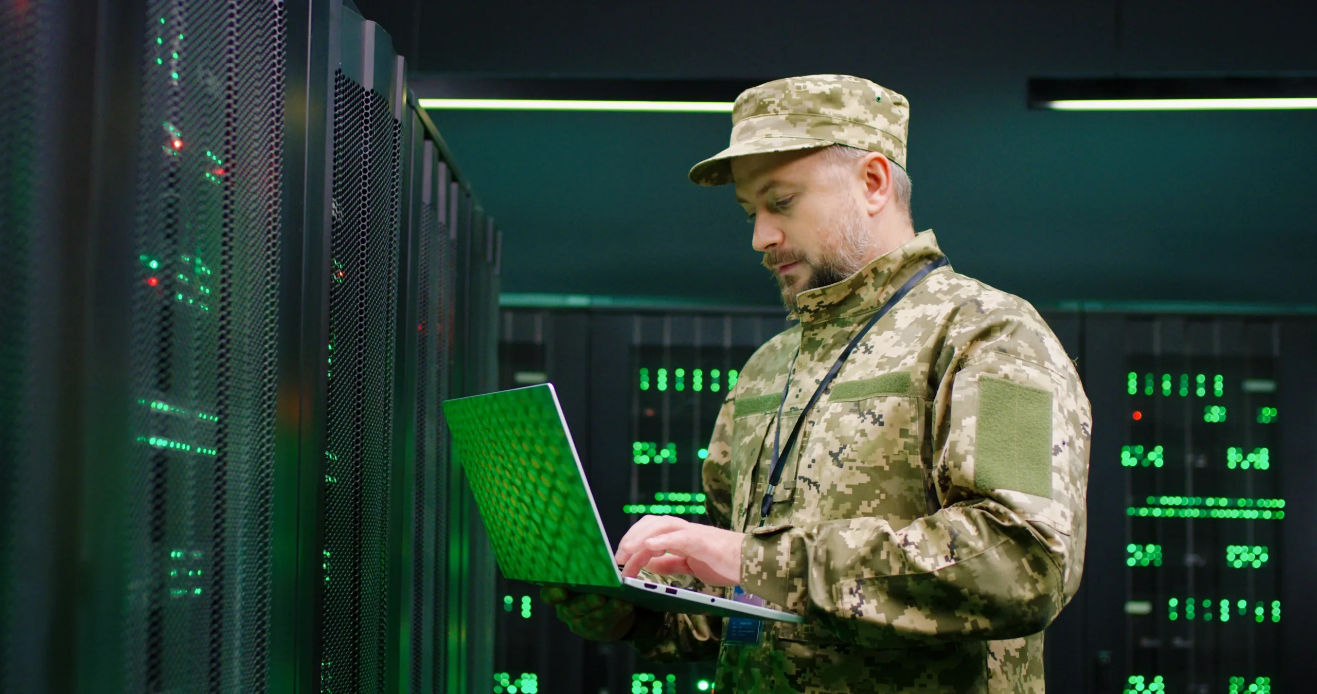 Caucasian,Male,Army,Technician,In,Camouglage,Costume,And,Hat,Typing Defence_5